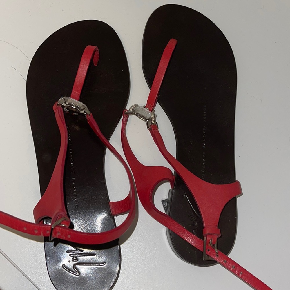 Giuseppe Zanotti women’s size 37 sandal with jewel accent.